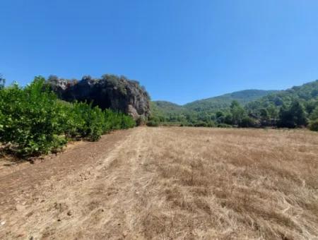 4.427 M2 Fruchtbares Land Mit Blick Auf Die Berge Und Die Natur In Ortaca Okçular Zu Verkaufen