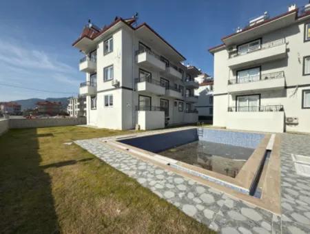 Ortaca Merkeze Yakın Havuzlu Sitede 1+1 55M2 Sıfır Daire Satılık.